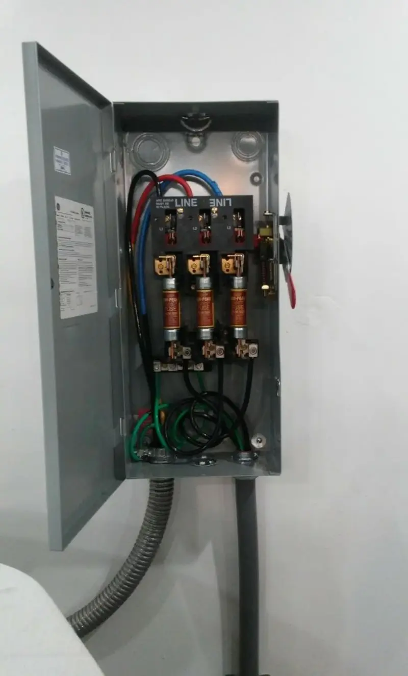 Three-phase disconnect switch installed for Smoke Detector Installation in Montcalm